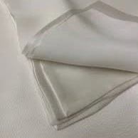 Lumieré silk pillow case folded up